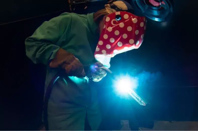 A student demonstrates her MIG welding technique at the grand opening of the new welding lab at South Central College, North Mankato, Minn., in September. Photos courtesy of South Central College